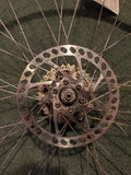 Used: 26" rear alloy disk wheel. 8/9 speed hub.